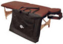 Oakworks One portable massage table with burgundy upholstery